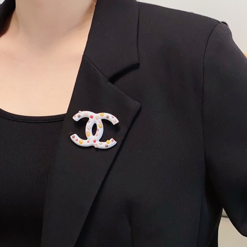 Ch**el brooches